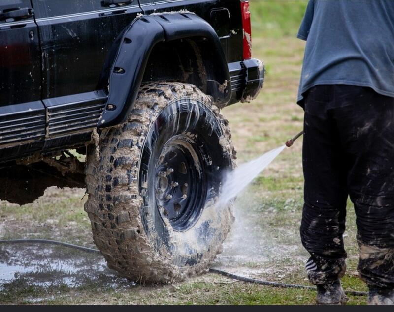 Pressure washing SUV